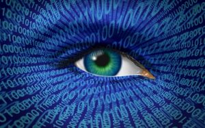 Technology security and Internet safety and privacy issues with a human eye and digital binary code as surveillance of hackers or hacking from cyber criminals watching prohibited private access to web sites with firewalls.